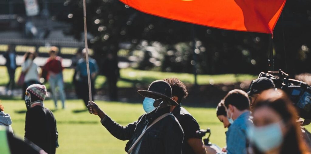 a person holding a flag