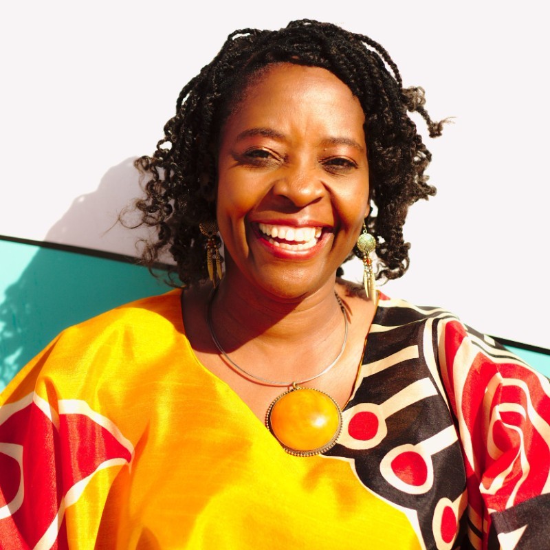Getrude Matshe - Senior Cultural Ambassador smiling at the camera